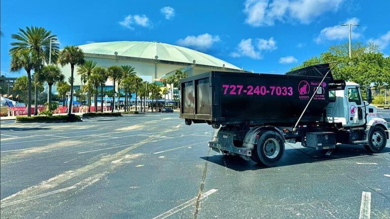 Elephants Dumpster Rental & Junk Removal roll-off truck outside Tropicana Field in St. Petersburg, FL
